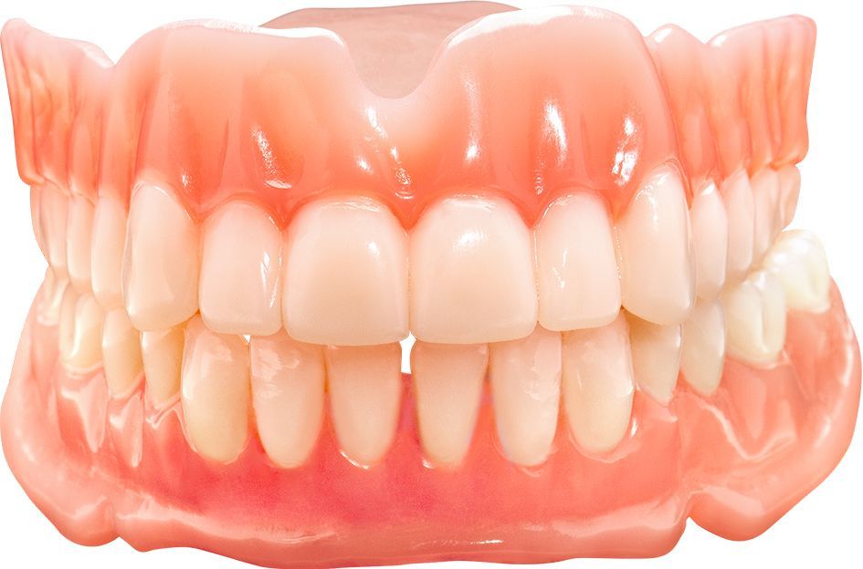 Complete dentures, upper and lower sets, showing artificial teeth and gum.