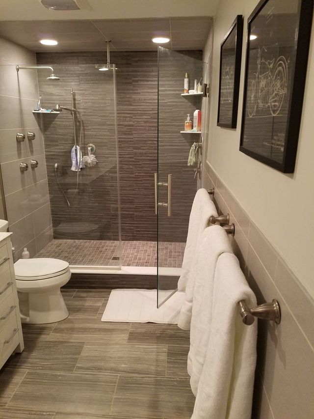 Shower Room With Hanging Towels — Indianapolis, IN — Tremain Corporation