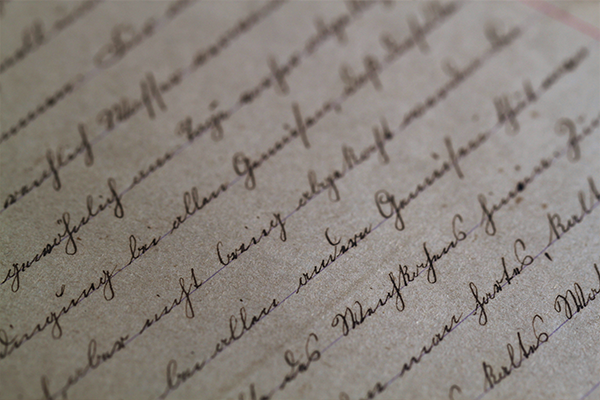 a close up of a piece of paper with handwriting on it