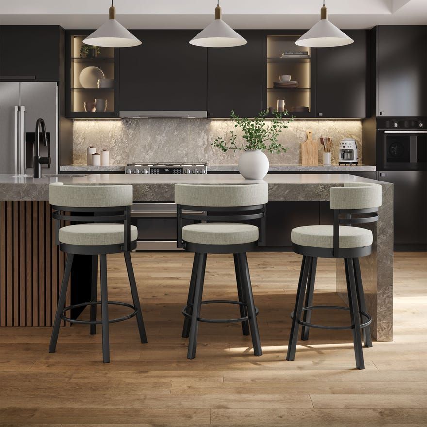 Empty wooden bar with black stools in a warm, rustic interior