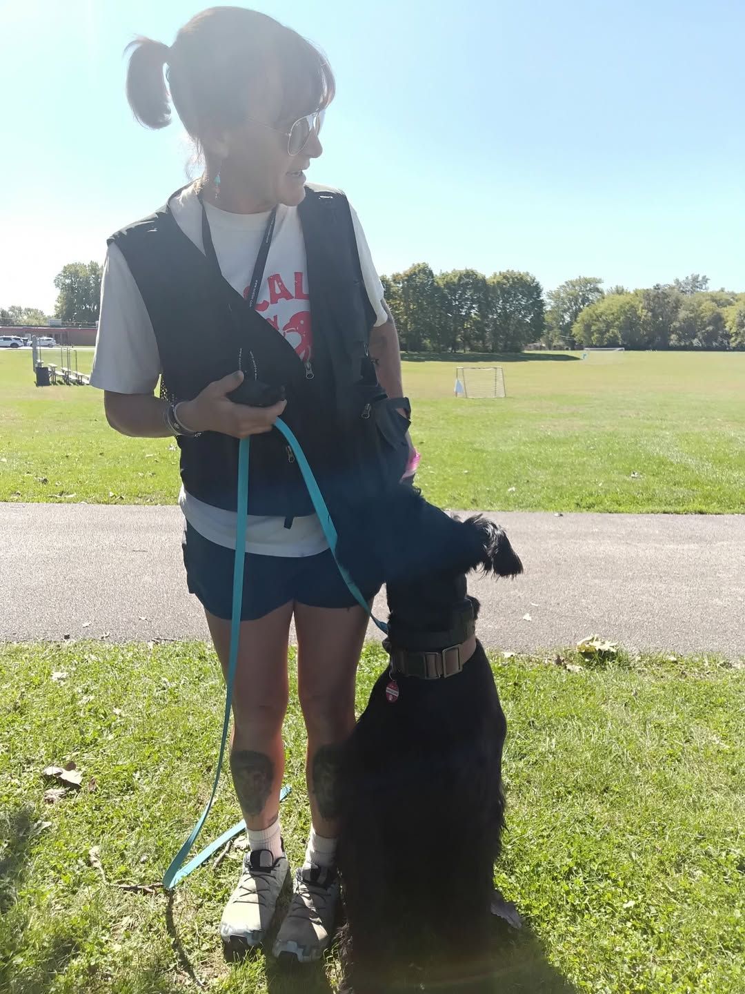Schnauzer owner learning K9 handler skills at Custom K9 Dog Training in Bourbonnais IL