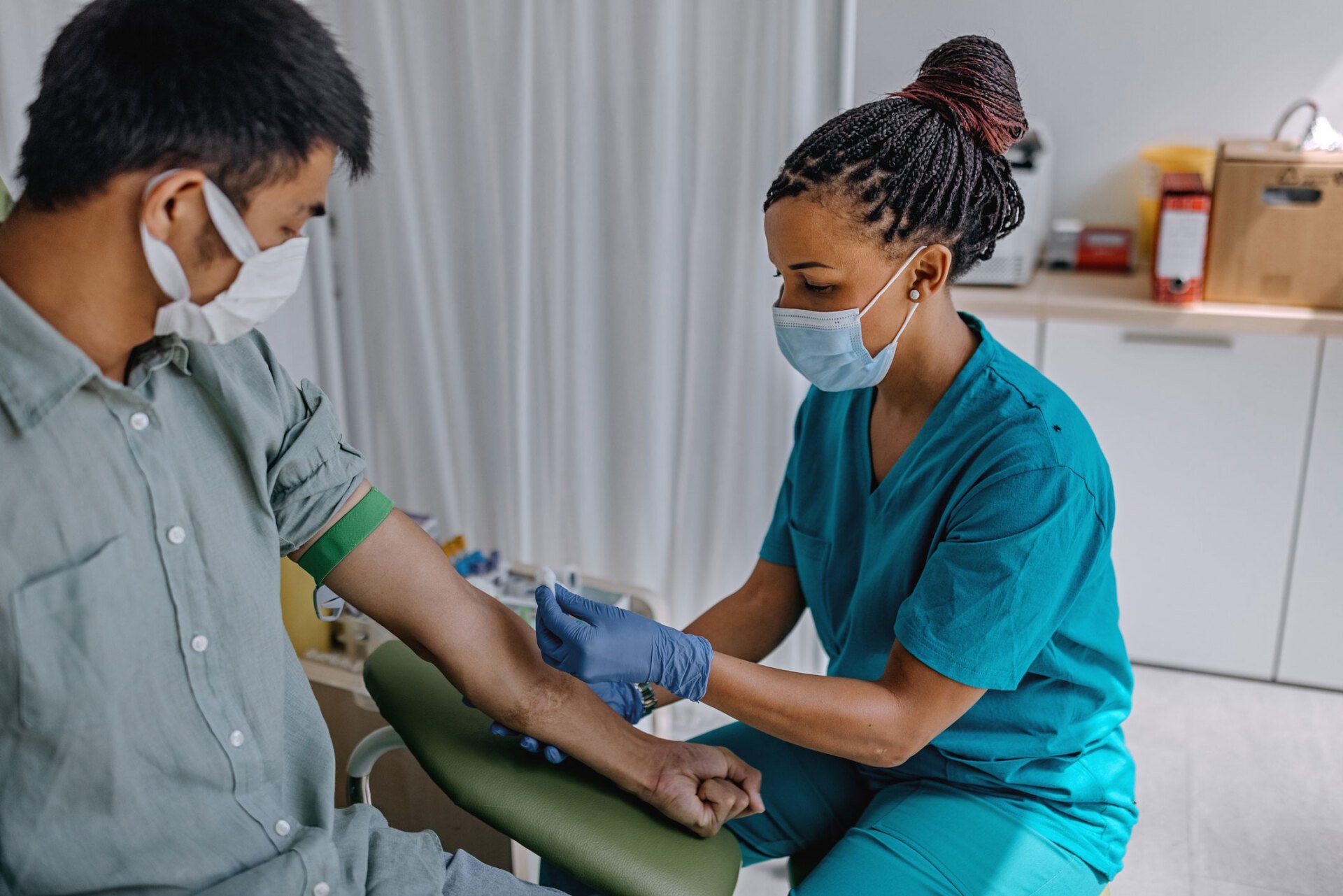 A Doctor Applying Aid To A Patient | Munster, IN | Community Chiropractic Clinic