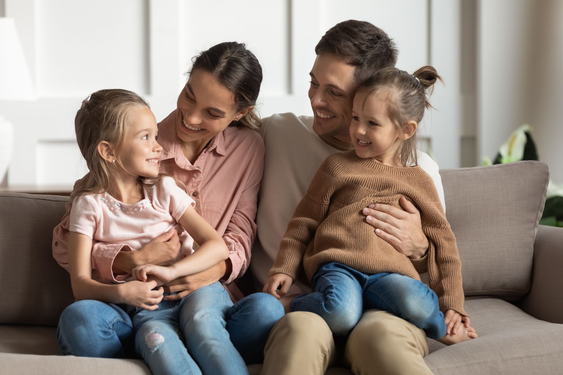 A Family is Sitting on a Couch Together — Lebanon, PA — Spitler, Kilgore & Enck, PC A Family is Sitting on a Couch Together — Lebanon, PA — Spitler, Kilgore & Enck, PC