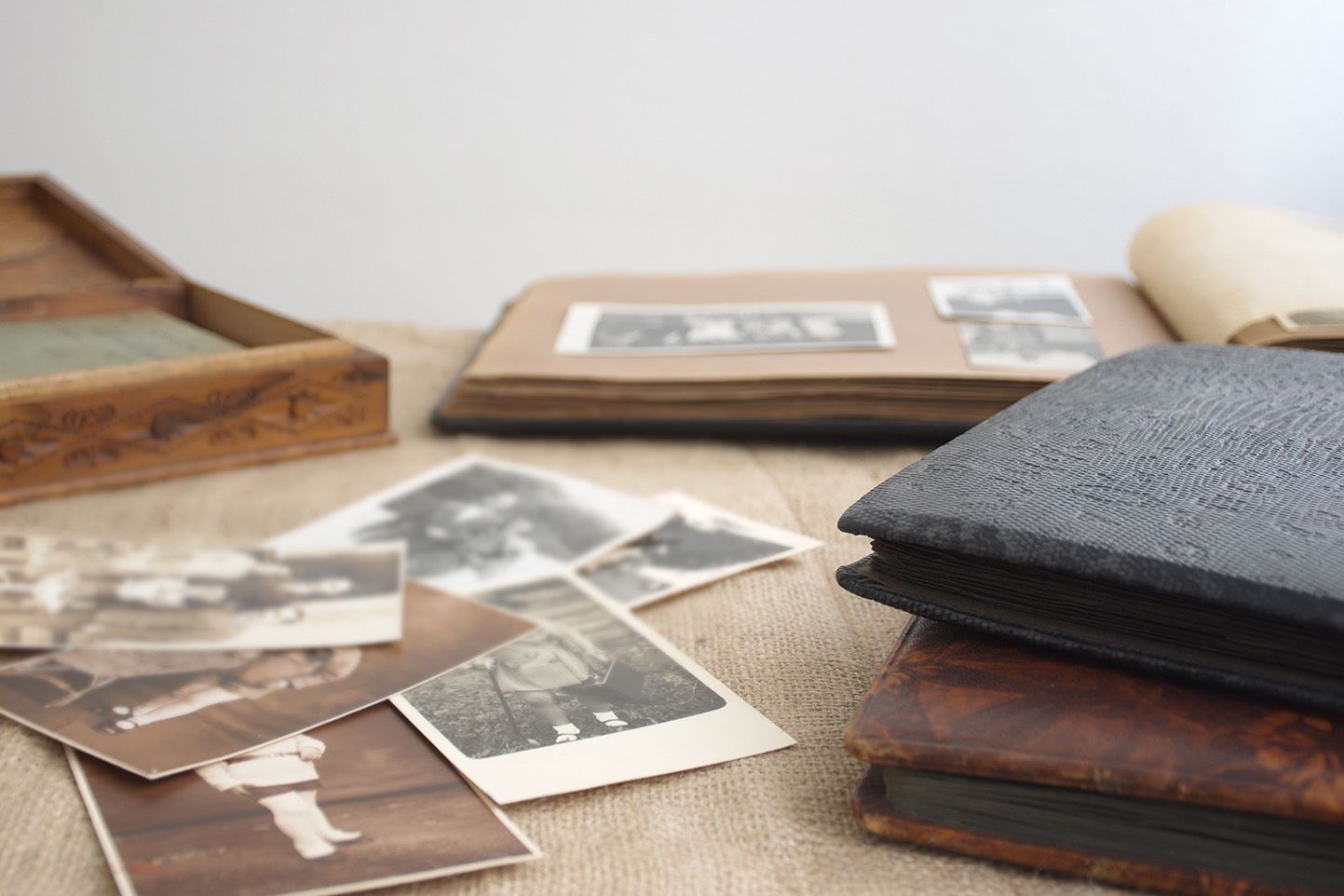 a stack of books sitting on top of each other on a table | BXB3 Corporation | Archive Solutions in CA