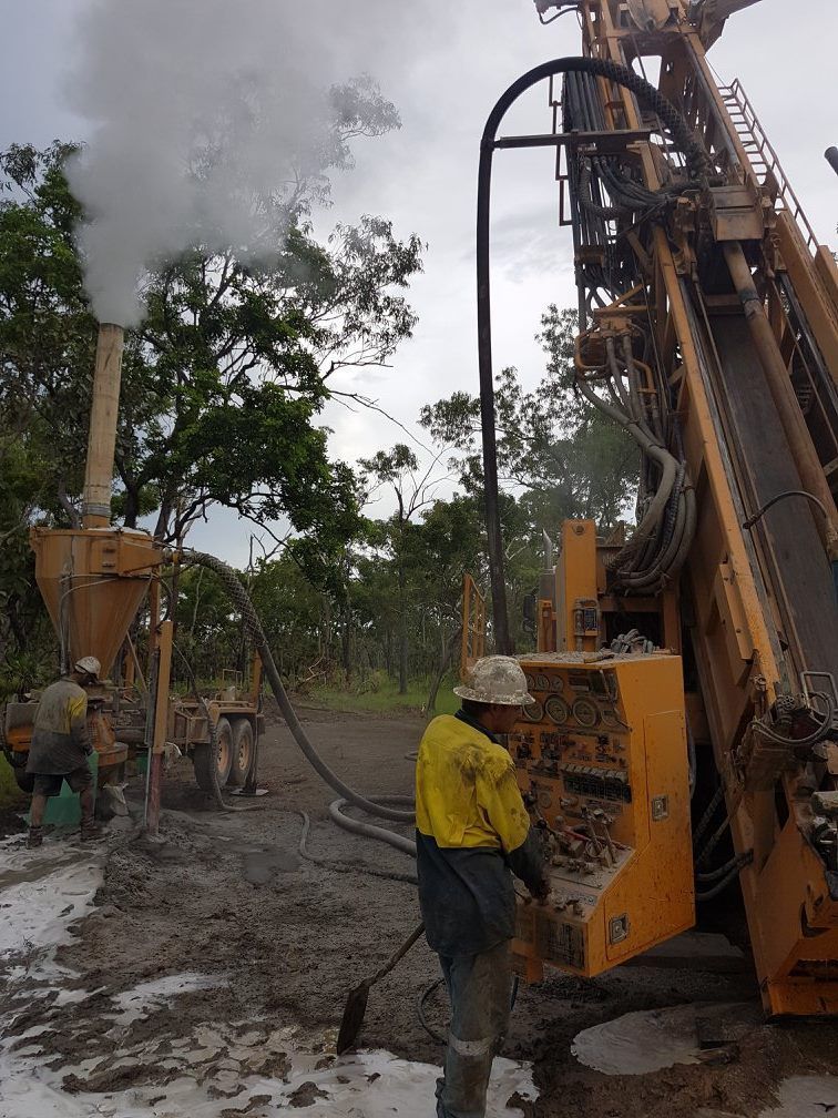 Drill Operators Actively Engaged in Building Water Borehole — Grid Drilling in Childers, QLD