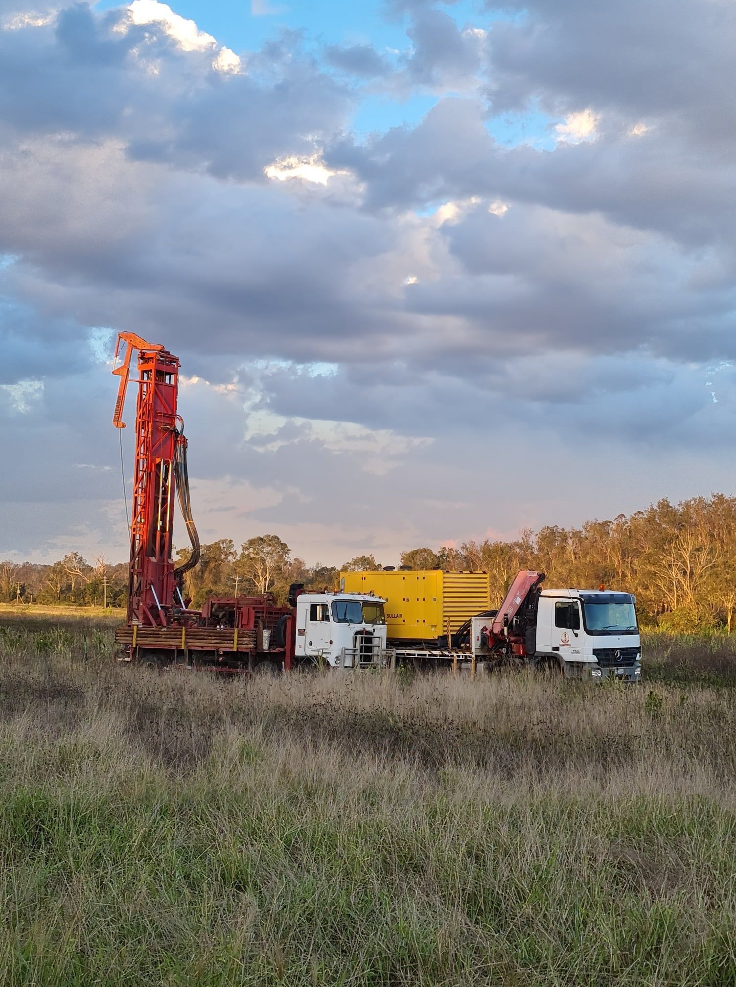 Trucks at the Construction Location — Grid Drilling in Mount Perry, QLD