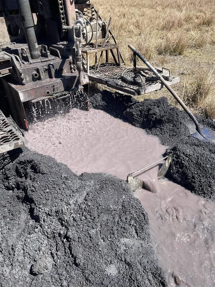 Muddy Water Emerging From the Borehole — Grid Drilling in Munduberra, QLD