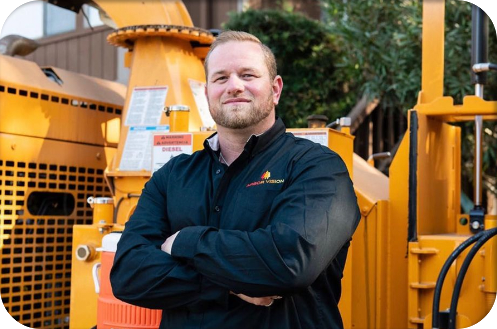 Michael Waller in front of a tree equipment