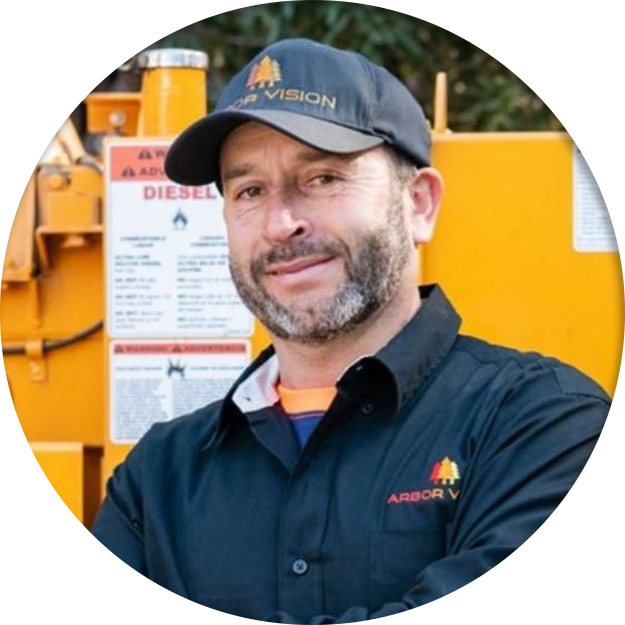 Arbor Vision Co-owner Gustavo Losoya in front of Tree Equipment
