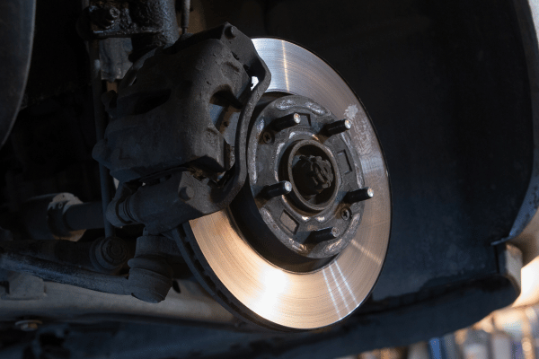 Close-up of brake rotor and caliper assembly