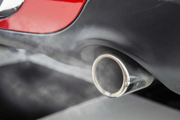 Vehicle exhaust pipe emitting smoke