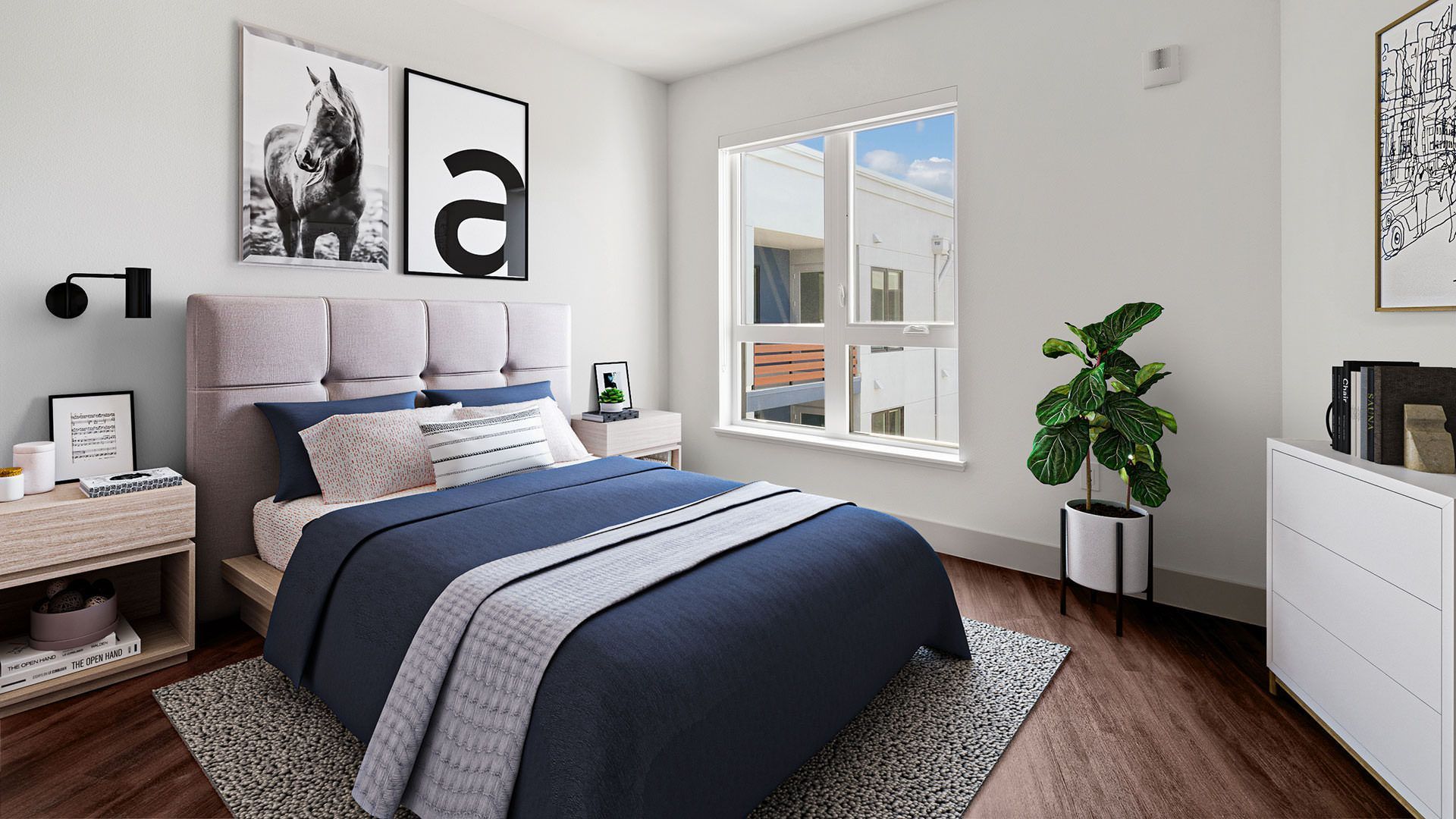 Bedroom with a bed, nightstands, artwork, and a window at The Waymark in Walnut Creek, CA.
