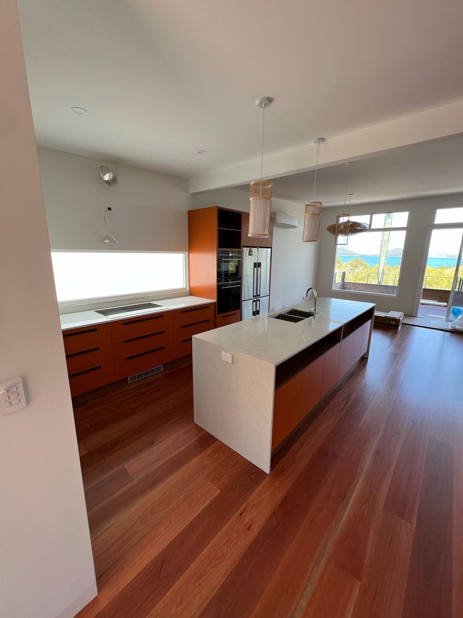 A Kitchen With A Sink, Drawers And A Window — The Kitchen & Bathroom Doctor in Nelson Bay, NSW