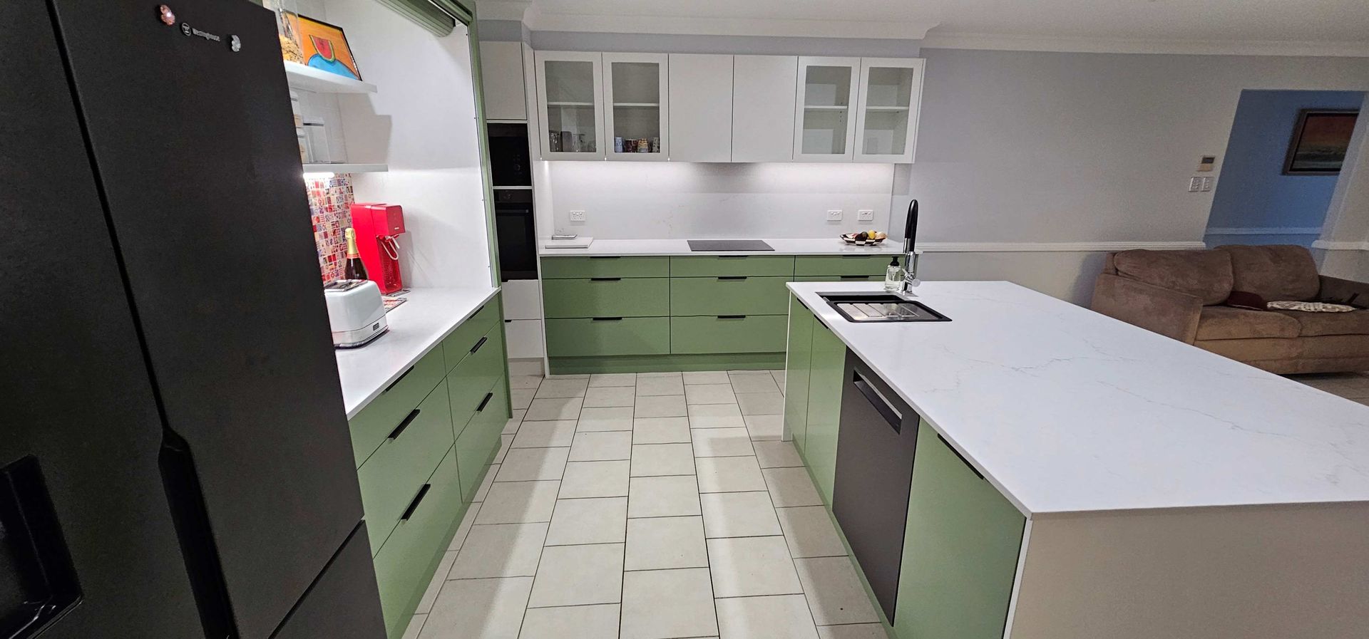 A Kitchen With White Cabinets And A Stainless Steel Sink — The Kitchen & Bathroom Doctor in Anna Bay, NSW