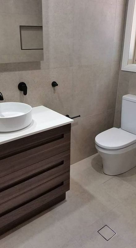 A Bathroom With A Sink , Toilet And Mirror — The Kitchen & Bathroom Doctor in Medowie, NSW