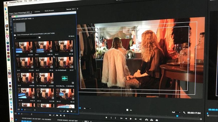 Video editing software displaying a warm-toned scene in the preview and clip thumbnails on the left.