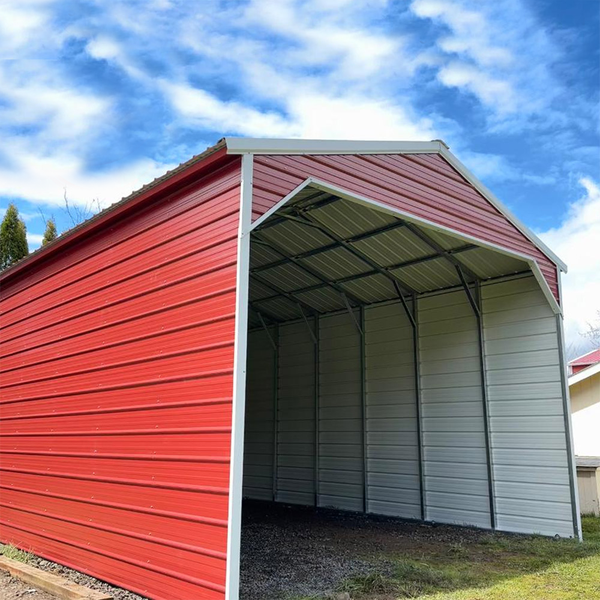 A red and white shed with a blue sky in the background.
