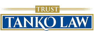 TANKO LAW logo with gold “TRUST” above blue wordmark and gold horizontal lines