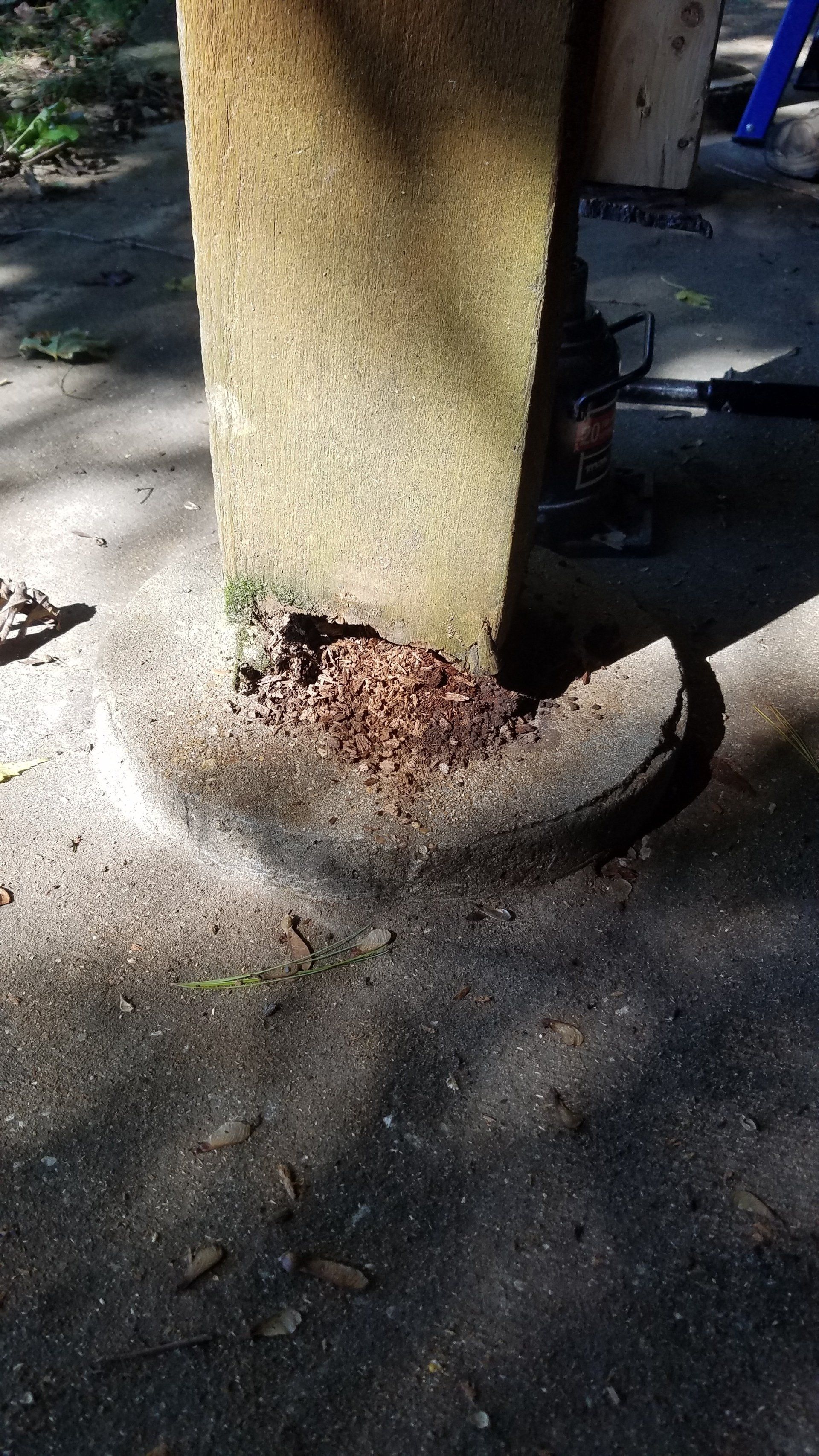 Wooden pole with dirt build up below — Fenton, MO — SRP Home Improvement