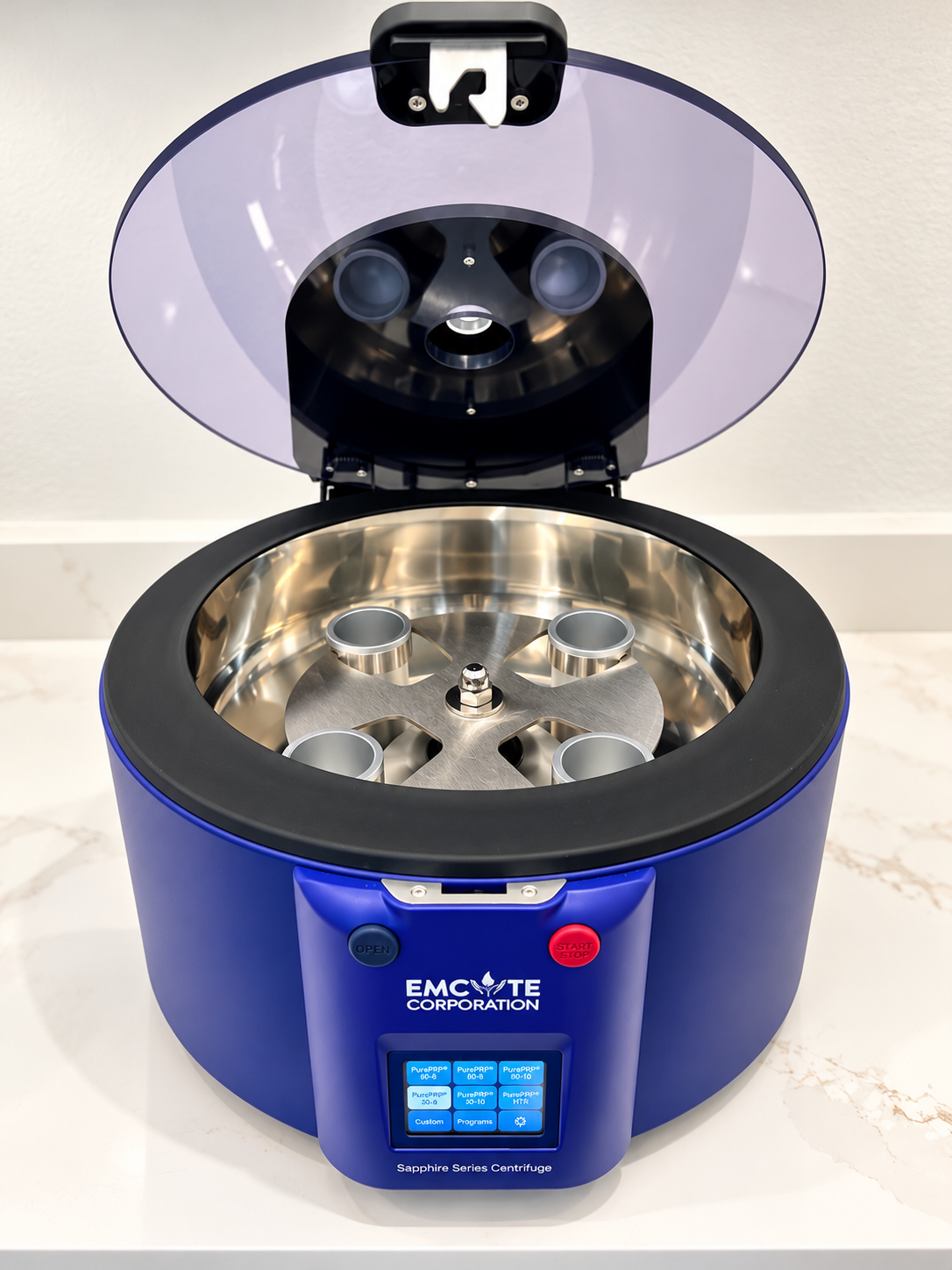 Blue lab centrifuge with open lid, showing stainless steel rotor and digital control panel