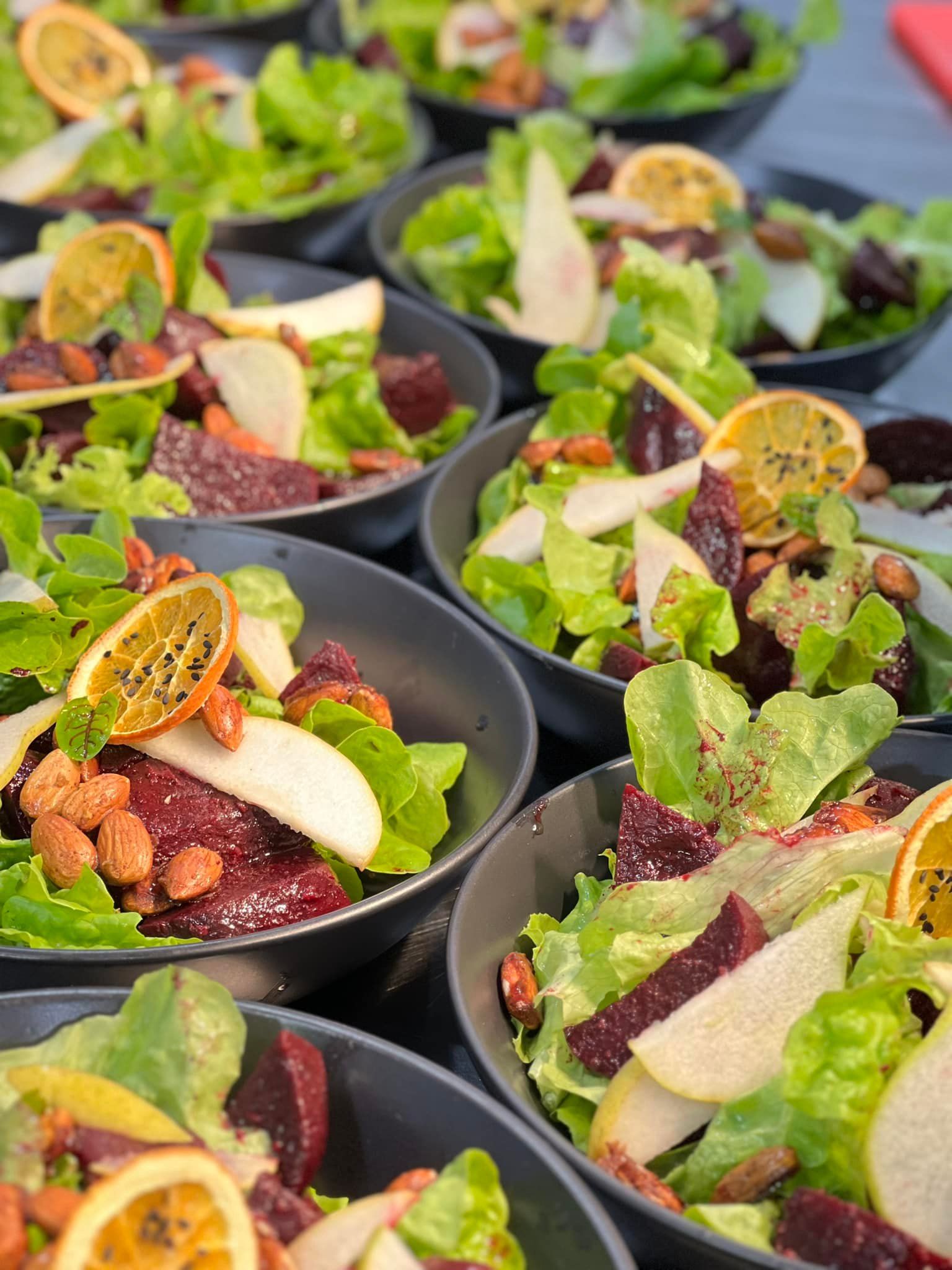 Eight bowls of salad topped with peanuts and a wedge of lemon  — Amanda Douglass Catering Service in Corlette, NSW
