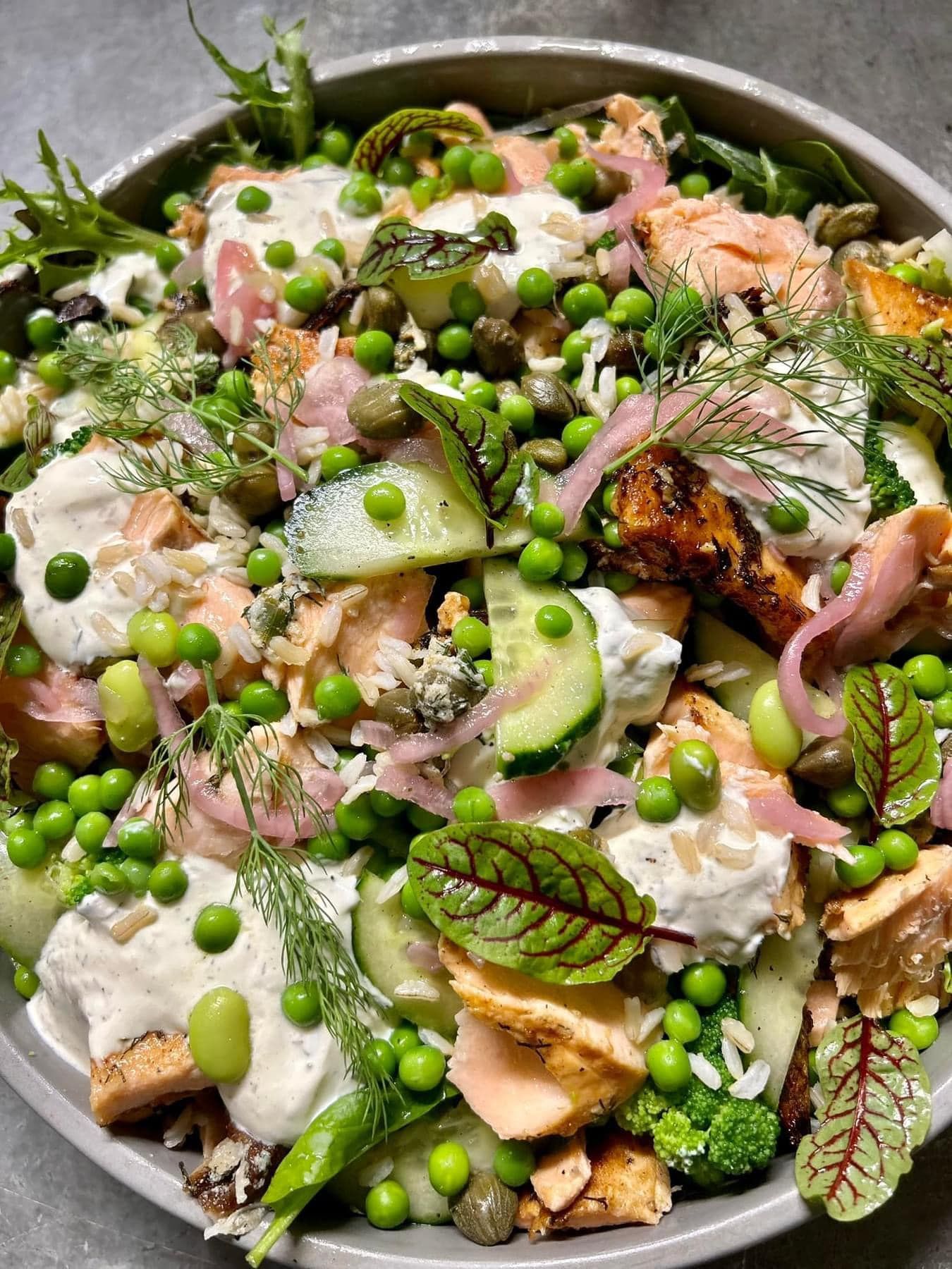 An extreme close up of a salmon salad — Amanda Douglass Catering Service in Corlette, NSW