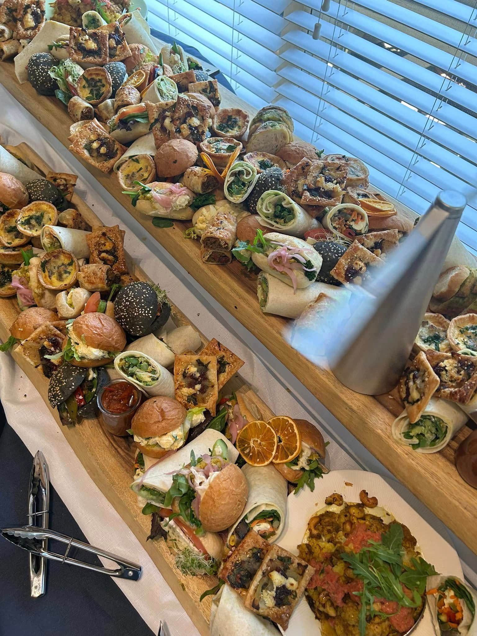 Wooden boards filled with various appetizers for catering — Amanda Douglass Catering Service in Corlette, NSW