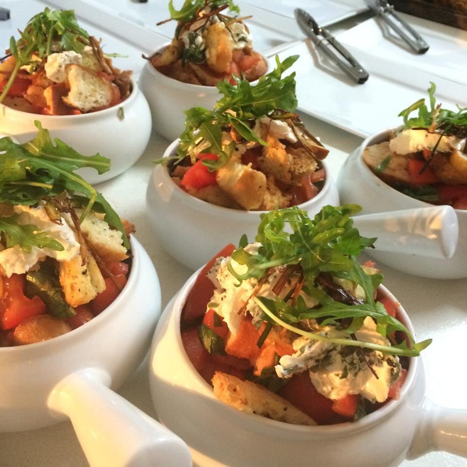 Small pots of vegetables topped with leaves — Amanda Douglass Catering Service in Corlette, NSW