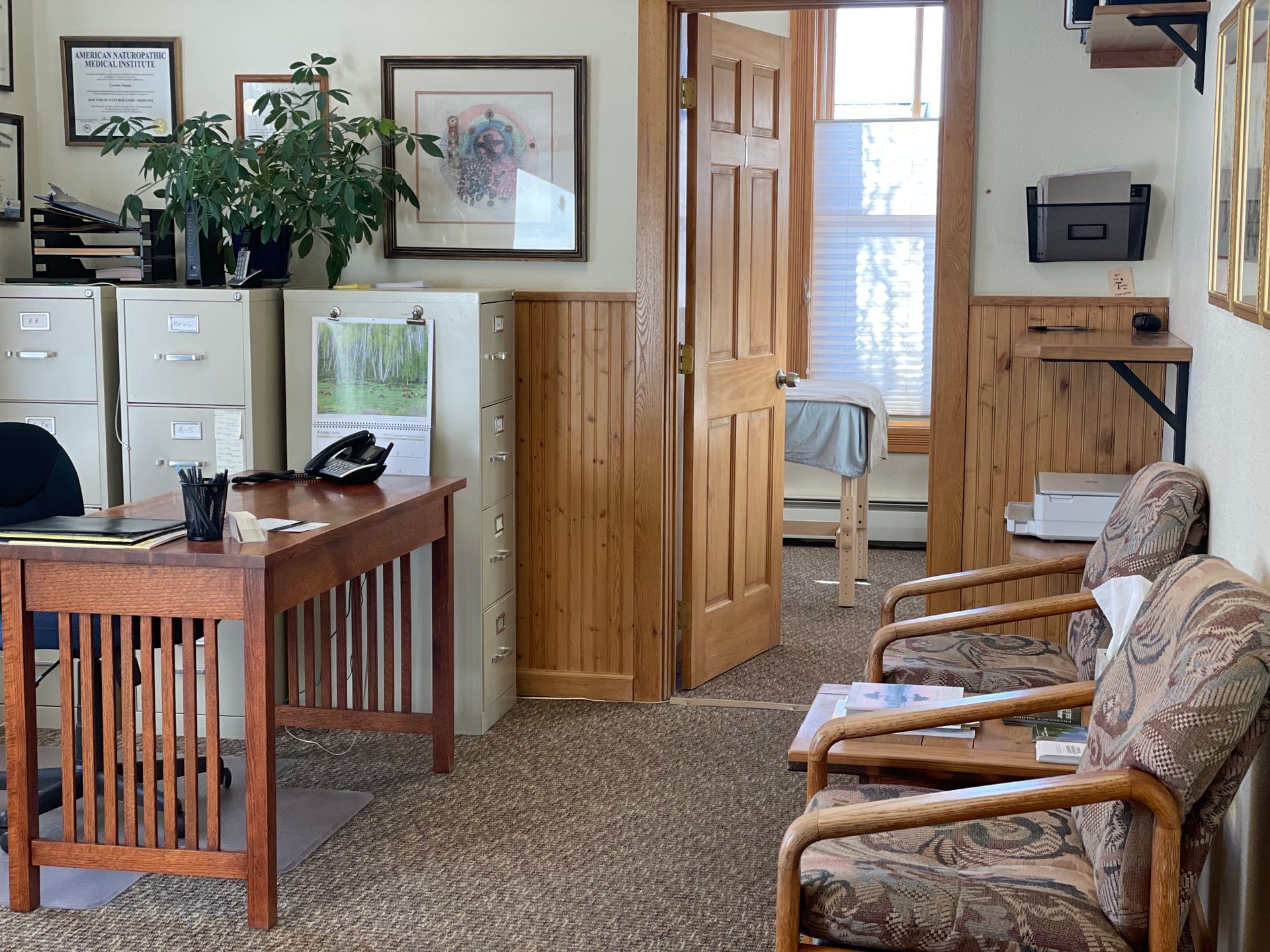alpine acupuncture interior office with chairs and acupuncture table