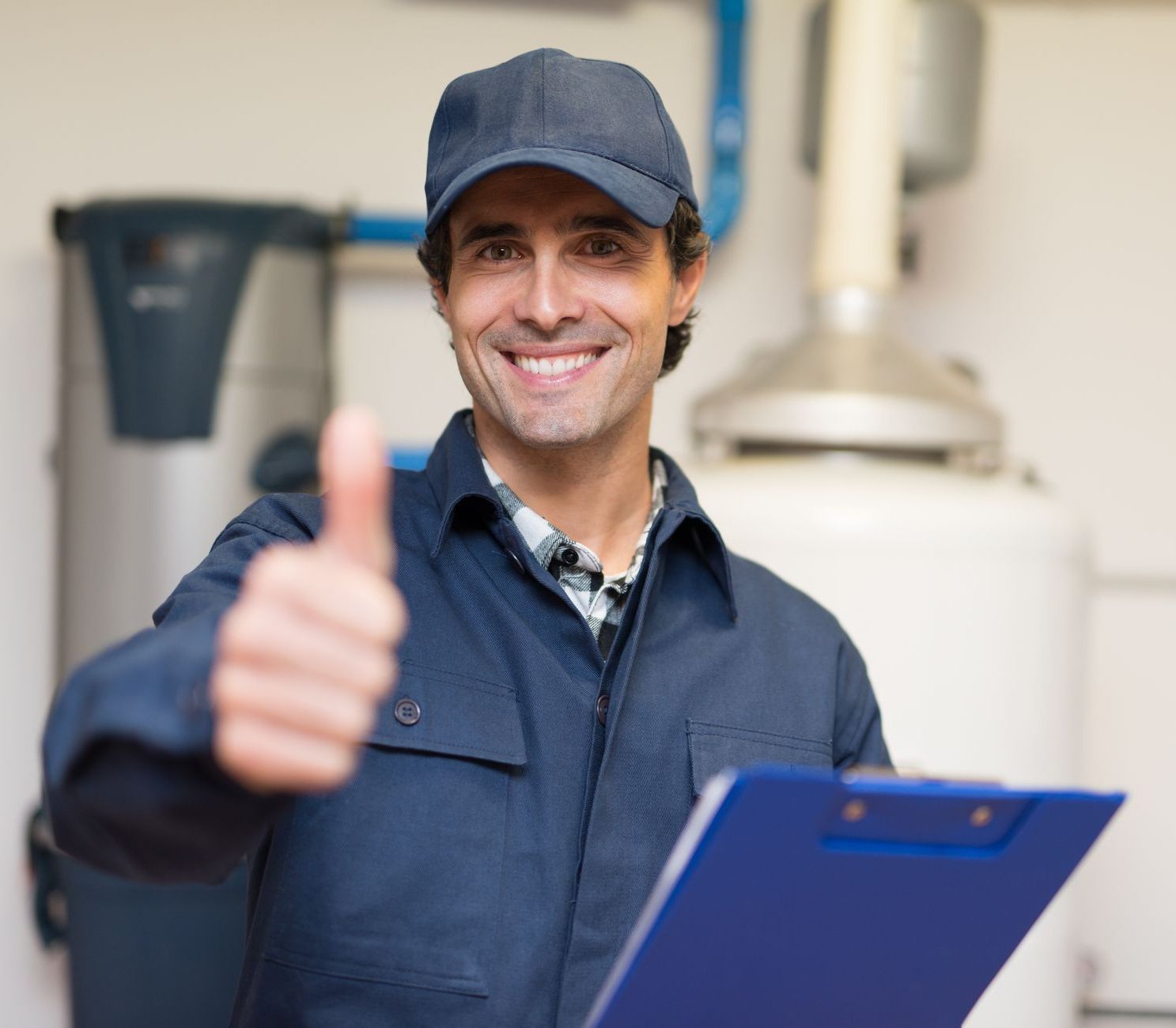 a man is giving a thumbs up while holding a clipboard
