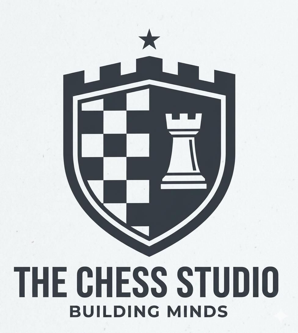 The Chess Studio logo with a shield, chess pieces, and the text “THE CHESS STUDIO” and “BUILDING MINDS”