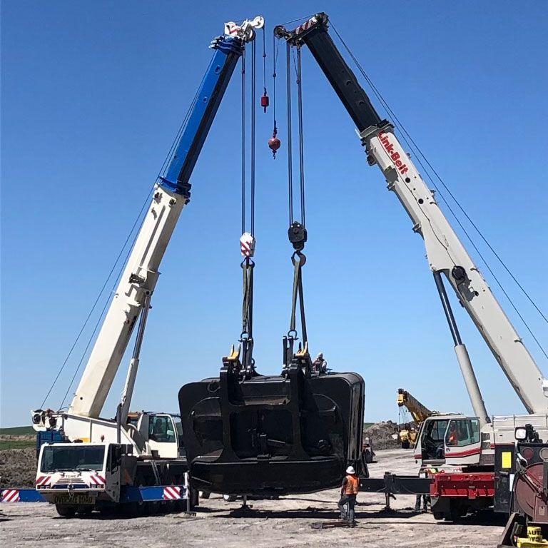 Crane Carrying a Pillar — Gillette, WY — Black Hawk Crane & Rigging Inc