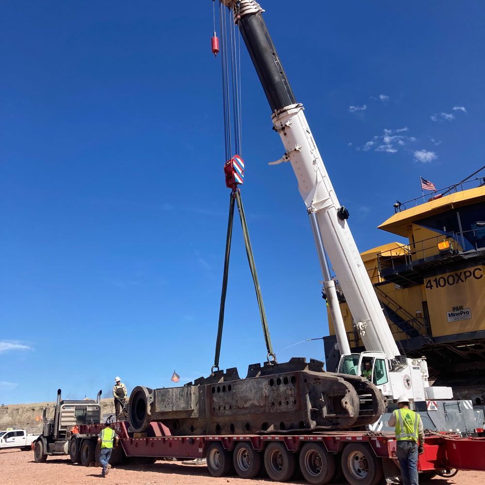 Heavy Equipment on A Flatbed Truck — Gillette, WY — Black Hawk Crane & Rigging Inc