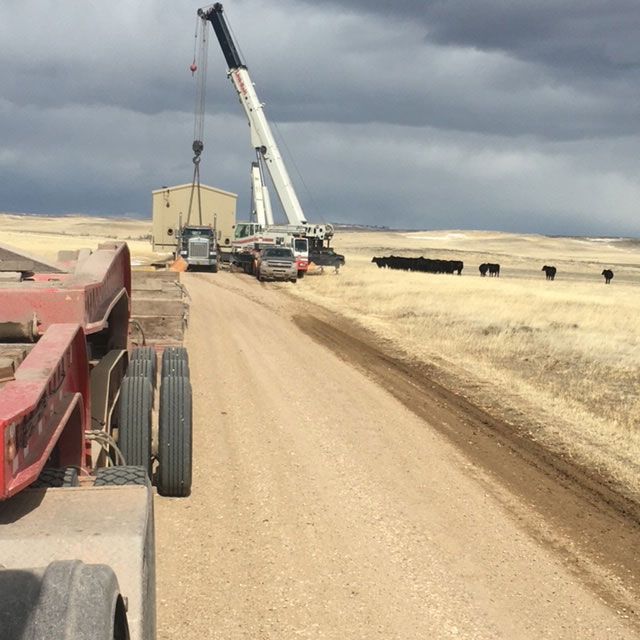 Truck Transporting a Mobile Storage — Gillette, WY — Black Hawk Crane & Rigging Inc