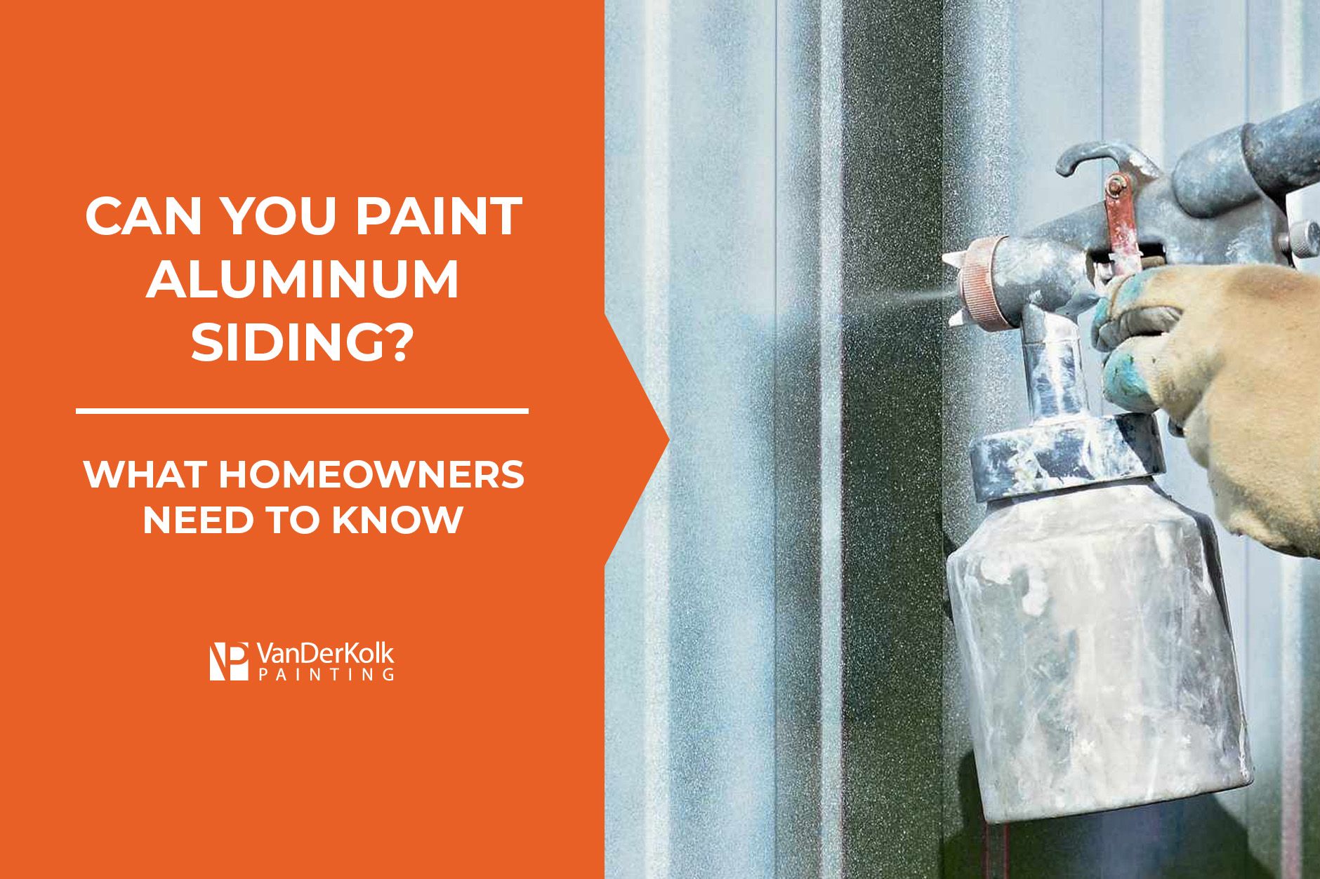 A person is spray painting aluminum siding on a building.