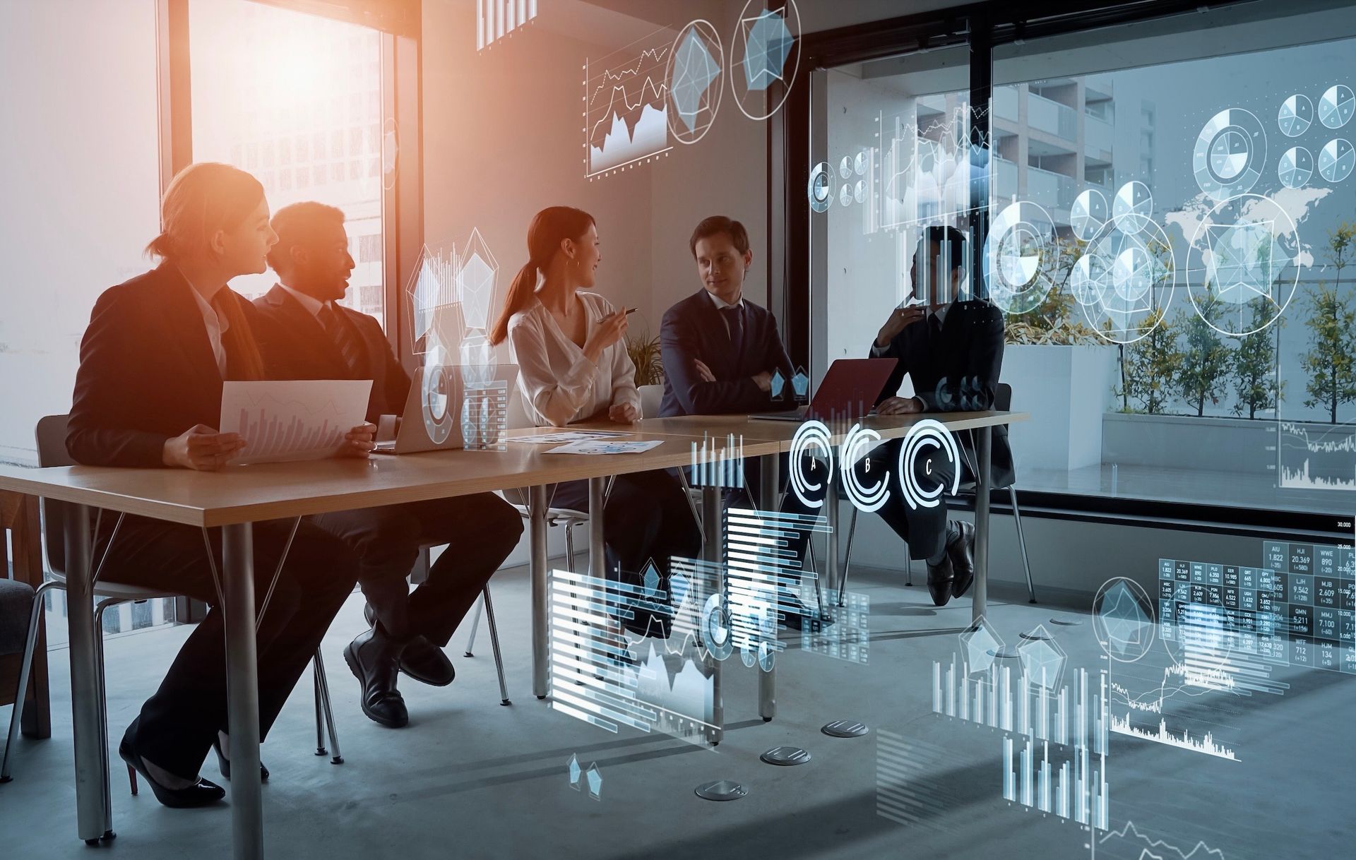 Business people at a table, discussing data visuals overlaid, in a modern office.