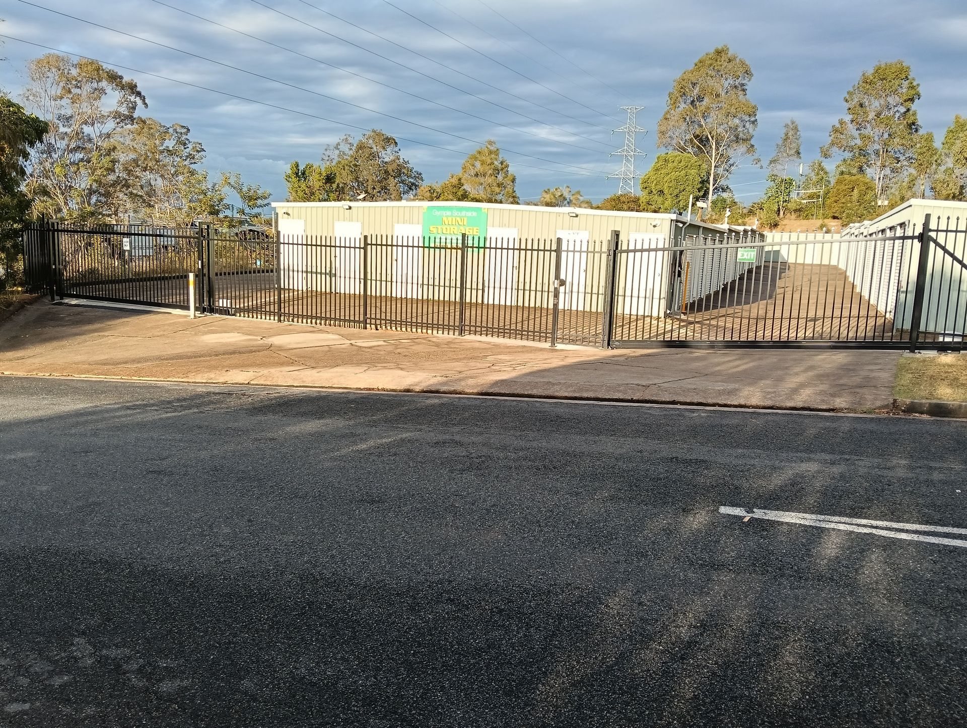 Gated Storage Units With Weathered Fencing and a Gravel Entrance — Gympie Southside Mini Storage in Southside, QLD