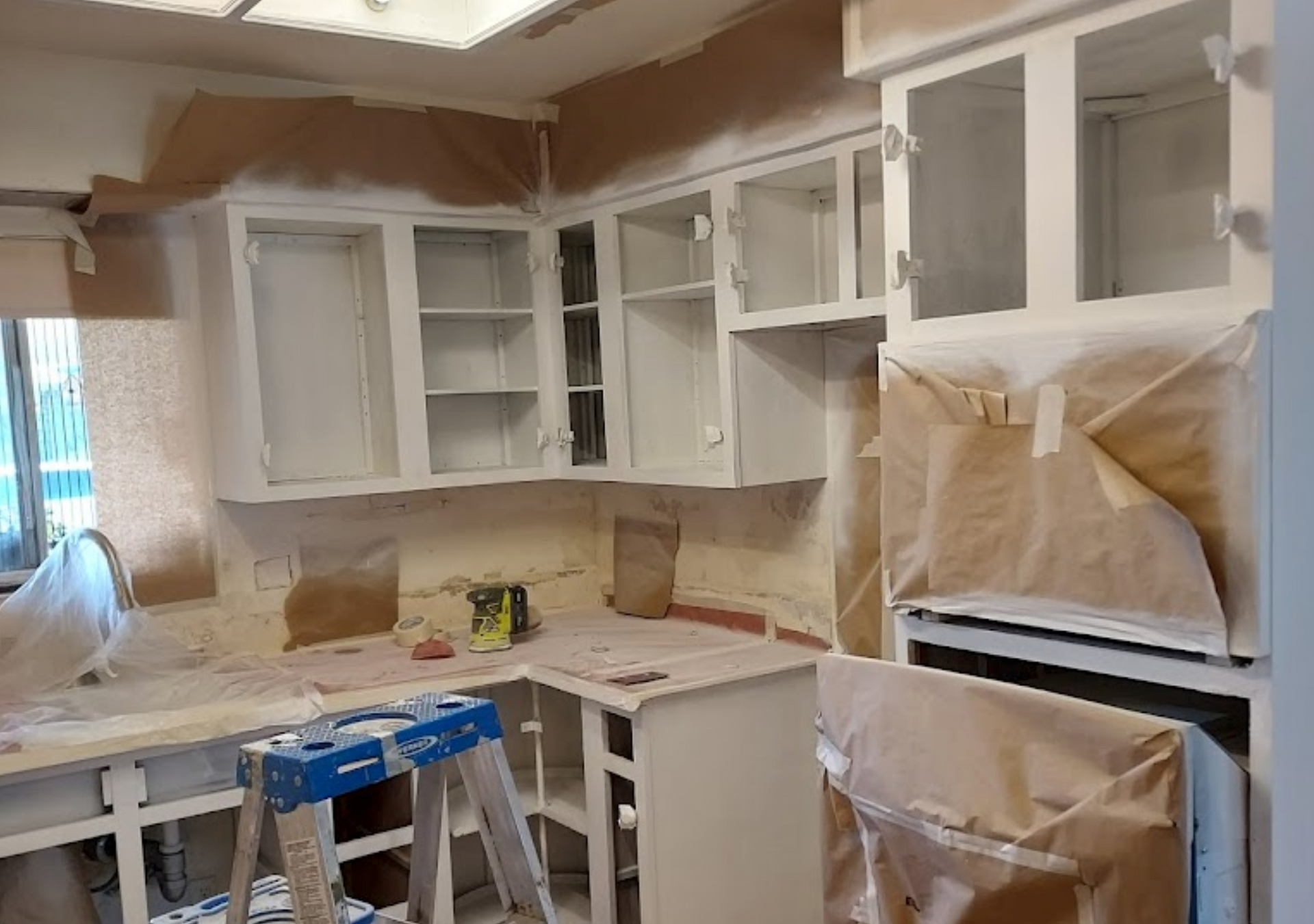 Professional cabinet painting in progress by Bratts Painting in Manteca.