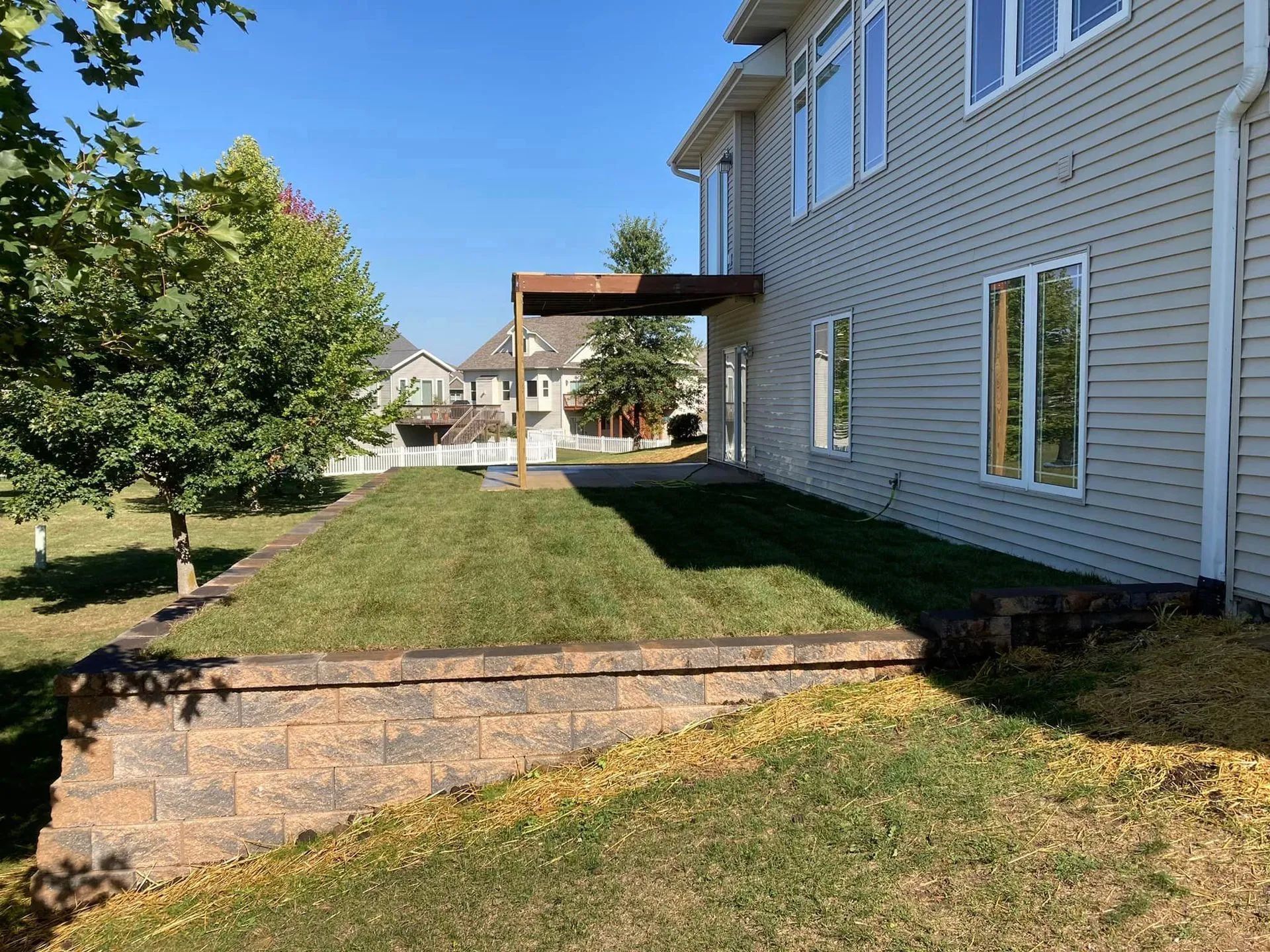 a large house with a large lawn in front of it