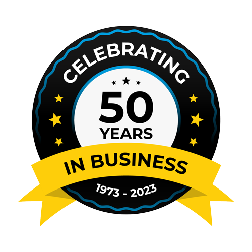 A black and white circle with a yellow ribbon that says celebrating 50 years in business.