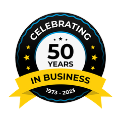 A black and white circle with a yellow ribbon that says celebrating 50 years in business.