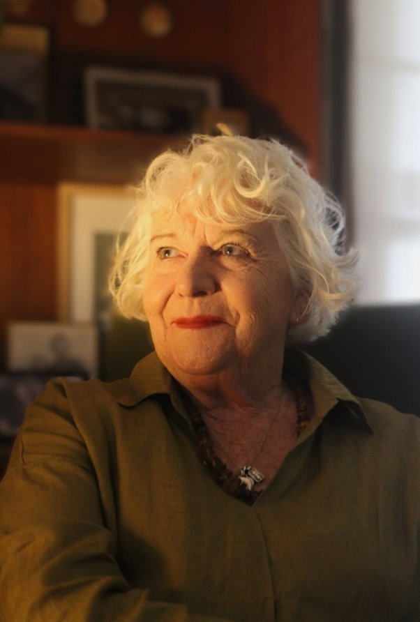 Portrait of a Woman With Curly White Hair in Warm Indoor Light — Beth Numeyer Counselling in Telarah, NSW