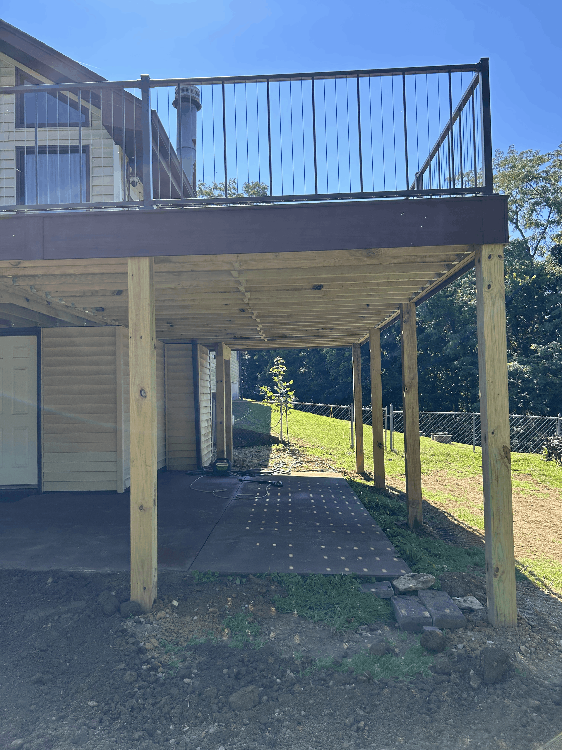 Multi-level wooden decks with custom seating areas.