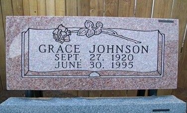 Grave marker for Grace Johnson with birth and death dates engraved on pink stone.