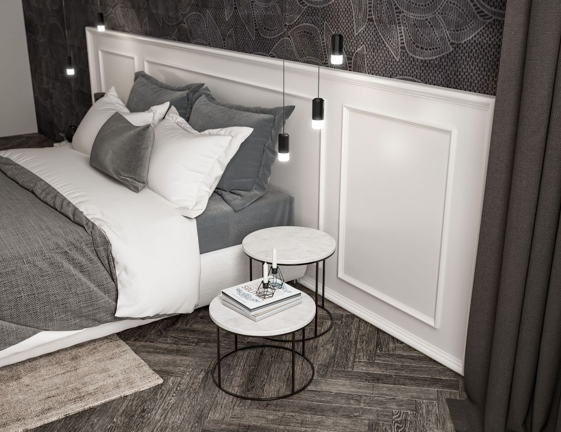 Angolo camera da letto con boiserie bianca