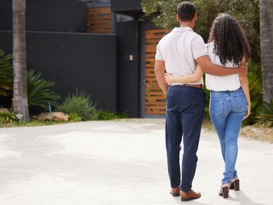 A couple looking at their new home purchase