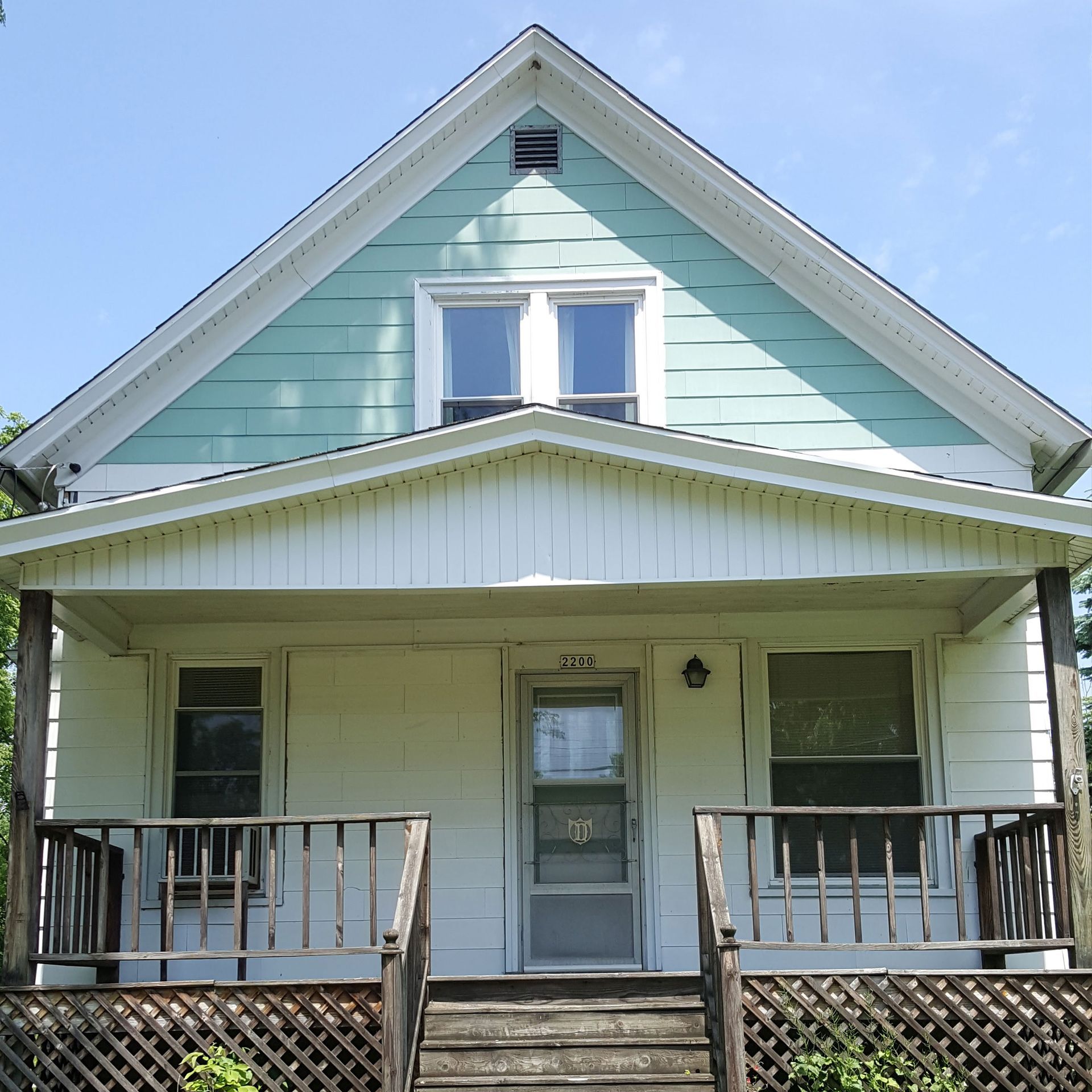 a painting of a house with a porch and stairs