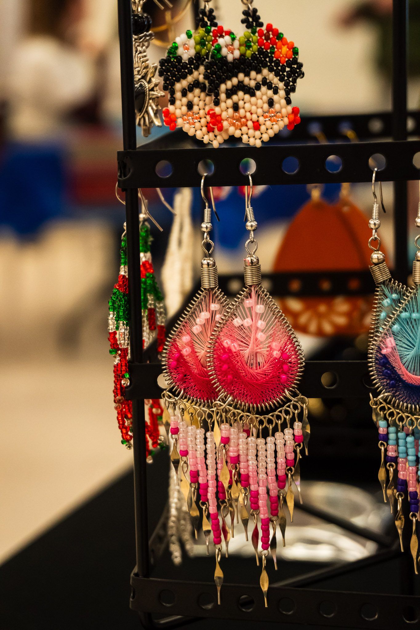 Colorful handcrafted beaded earrings by Latin American artisans photographed for My Silver Linings.