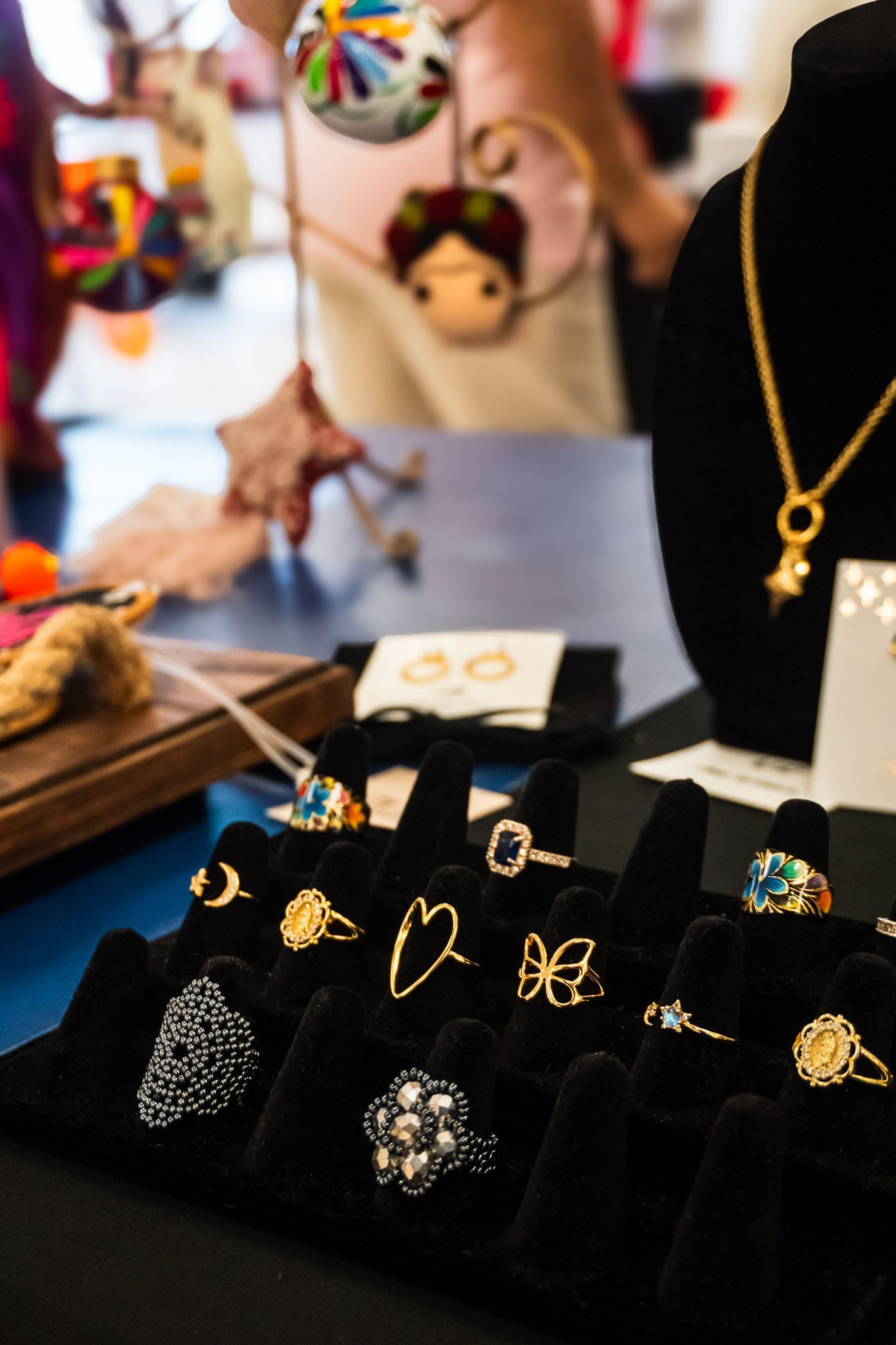 Handmade artisan rings displayed at My Silver Linings Boutique.
