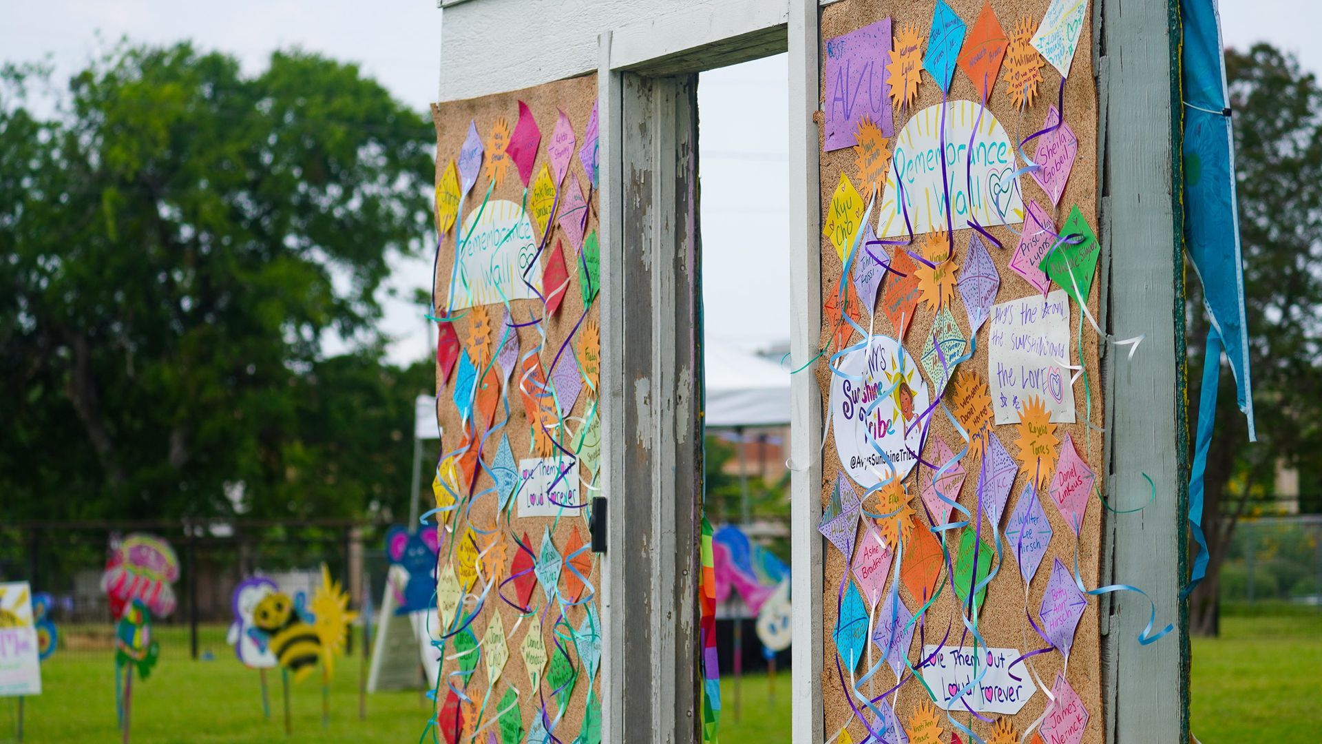 Decorated kites displayed during the Avy's Sunshine Kite Festival community event in Dallas.